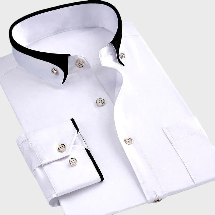 White dress shirt with black collar and cuffs on a white background