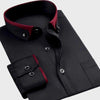 Black dress shirt with red inner collar and cuffs on a light gray background